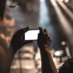 Smartphone, hands, screen — Canva Pro Group Buy Offering Access to Premium Design Tools Without High Fees